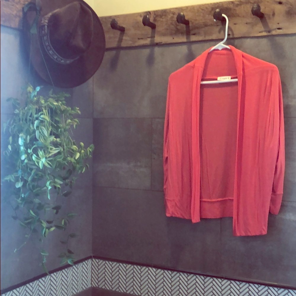 Women’s 3/4 length cardigan.